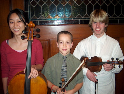 Soloists for the Corelli Concerto Grosso in the Merrimack Valley String Orchestra Concert Dec. 11 are: l. to r. - Wenxi Liu, cello (North Andover), Paul Cronin, violin (Atkinson, NH), and Owen Vail, violin (Georgetown).